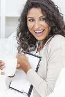 Woman Laughing Tablet Computer Drinking Coffee