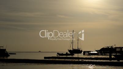 Sunrise at Naama Bay, Red Sea and motor yachts, Sharm el Sheikh, Egypt