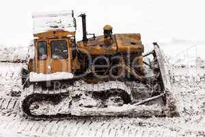 Bulldozer at building construction site