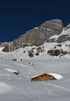 Beautiful winter landscape in the mountains, timber hut