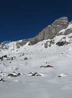 Winter scenery in the mountains, huts