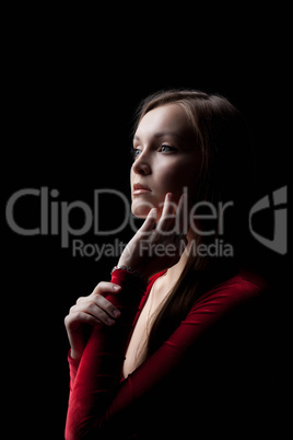 Beautiful young woman portrait in red cloth