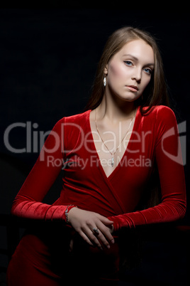 Pretty young woman portrait in red dress