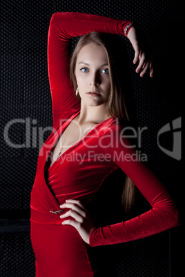 Beautiful young woman portrait in red dress