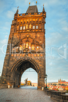 Charles bridge in Prague at sunrise time