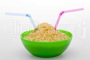 Rice and straw in green bowl