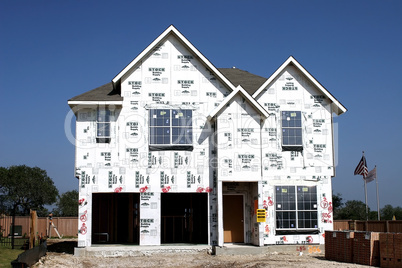 House under construction sheeting h