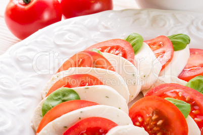 tomato with mozzarella cheese