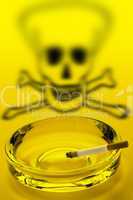 Toxic ashtray with smoking cigaret
