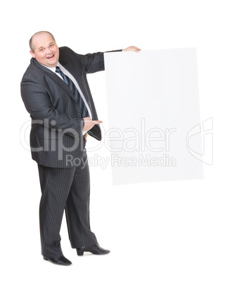 Cheerful overweight man with a blank sign