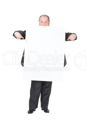 Cheerful overweight man with a blank sign