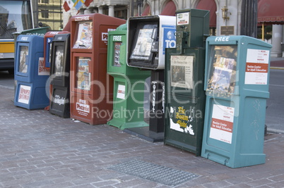 Sidewalk newspaper stands