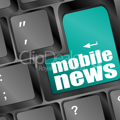 mobile news word on black keyboard and green button