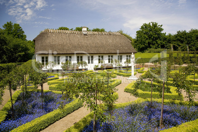 Old house and beautiful stylish gar