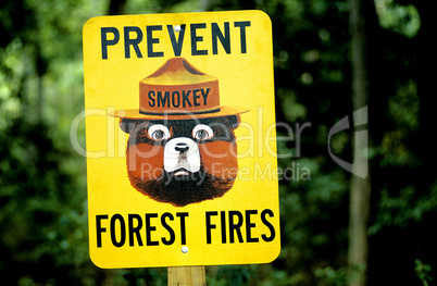 Sign with Smokey the Bear
