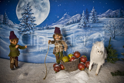 Two shepherds in a scenic winter landscape