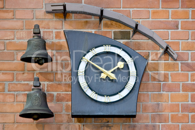 Modern wall clock and two bells