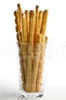 Glass of Italian style breadsticks