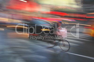 Motion blur of a bicycle racing thr