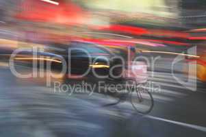 Motion blur of a bicycle racing thr