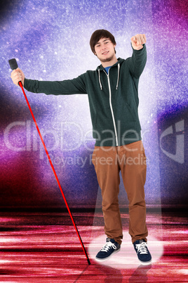 Young man at the microphone thanks the audience