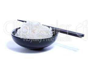 Black bowl with white rice and chop