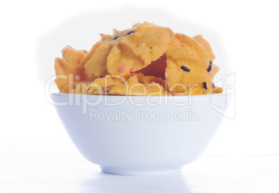 Small, white bowl with cookies