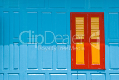 Blue wall with closed window