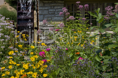 Wildflowers with Water wheel.