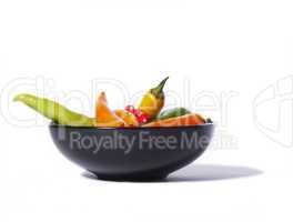 Chili peppers in a black bowl