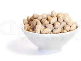 White bowl with unshelled peanuts