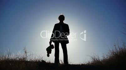 Silhouette of Girl with Teddy Bear