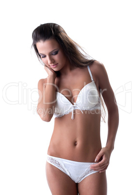 Young woman portrait in sexy white denim isolated