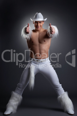 Sexy dancer in white cowboy costume