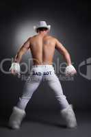 young man - dancer in white cowboy costume