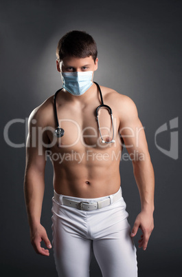 Sexy dancer in doctor costume with  stethoscope