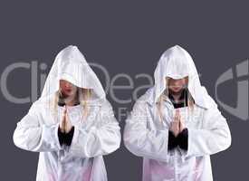 Two transvestites in white cloaks