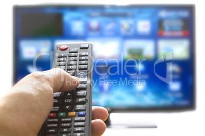 Smart tv and hand pressing remote control