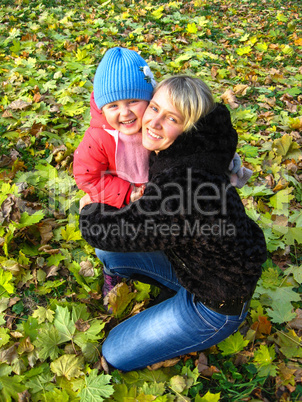 Happy and smiling mother and her child