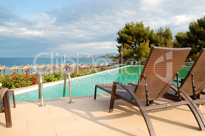 Swimming pool by a beach at the modern luxury hotel, Halkidiki,
