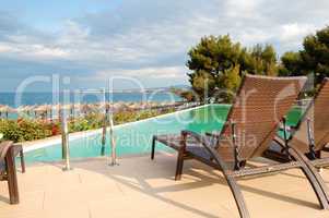 Swimming pool by a beach at the modern luxury hotel, Halkidiki,