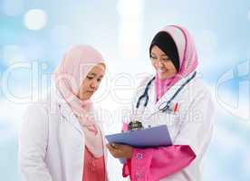 Two Southeast Asian Muslim medical doctor