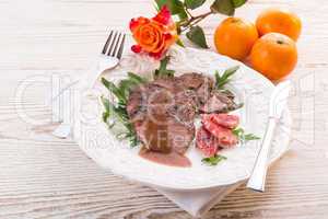 crunchy duck's breast with orange and rucola