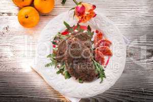 crunchy duck's breast with orange and rucola