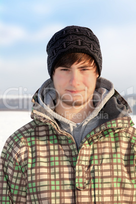 Portrait of a young man in winter