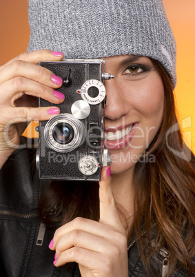 Woman Looks Right at the Camera taking a picture too