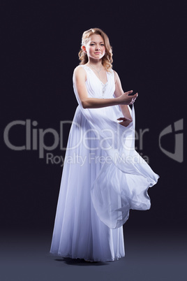 Young woman in beautiful long dress