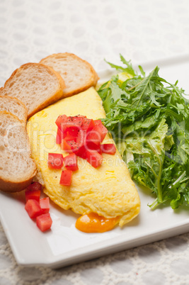 cheese ometette with tomato and salad