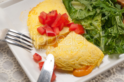 cheese ometette with tomato and salad