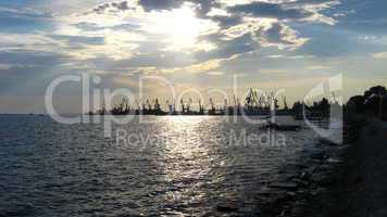 panorama of the evening sea with docks